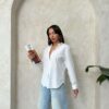witte blouse